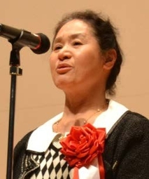 野口真理子 氏