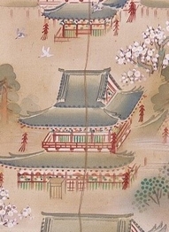 五重塔からお堂へと綱が延びている