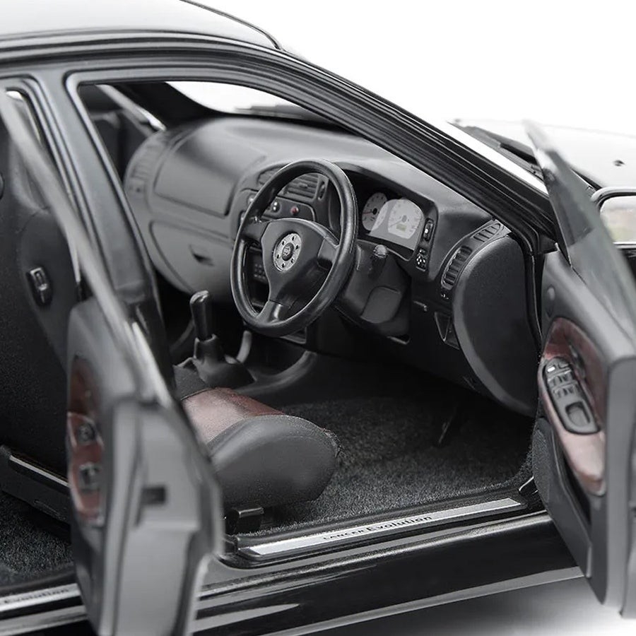 モーターヘリックス 1/18スケール M84002 三菱 Lancer Evolution IV ピレネーブラックパール