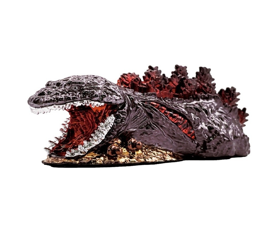 ▲オリジナルゴジラ金属フィギュア（長さ13cm、横幅5.5cm）