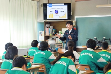 マンション大規模修繕工事会社「セラフ榎本」が 川口市立岸川中学校でドローンを用いたSDGs講演を実施