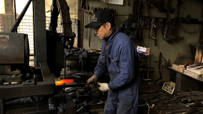三輪 英俊氏