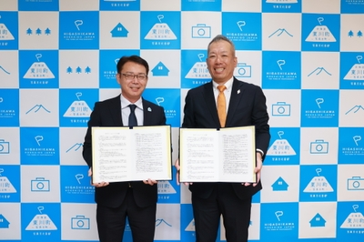 写真左： 東川町長 菊地 伸／写真右：三菱地所株式会社 TOKYOTORCH事業部長 上田寛氏