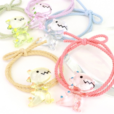 クリア恐竜つきヘアゴム 各180円