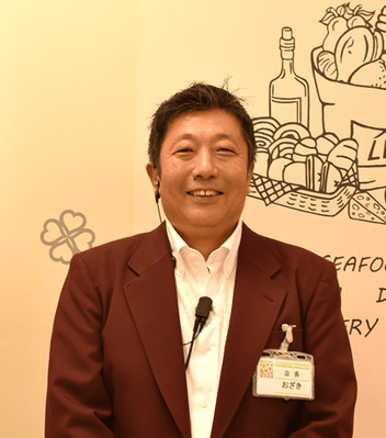 尾崎史章店長