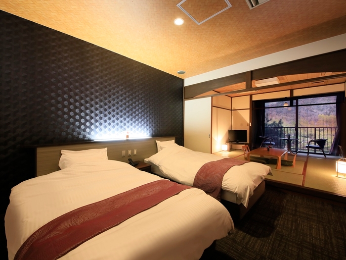 落ち着いた雰囲気の和モダンな <客室>