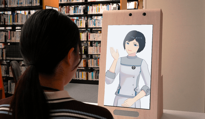 近畿大学中央図書館の受付窓口に設置したアバターディスプレイ