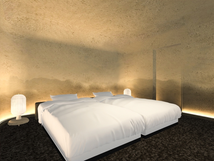 壁面を左官技術で仕上げた寝室