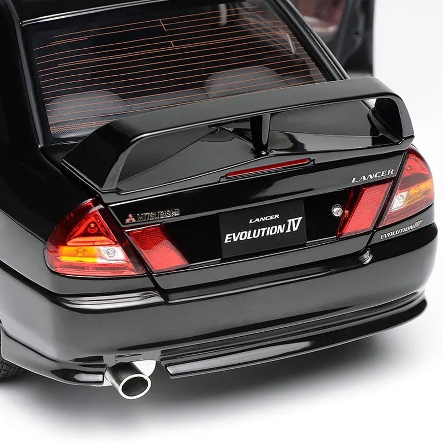 モーターヘリックス 1/18スケール M84002 三菱 Lancer Evolution IV ピレネーブラックパール