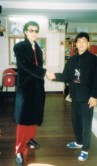 GOD(左) 井岡弘樹(右)