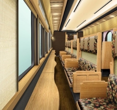 3号車と4号車には、西山の山並みを堪能できるよう、桜を描いた窓向き座席を設置(イメージは3号車)