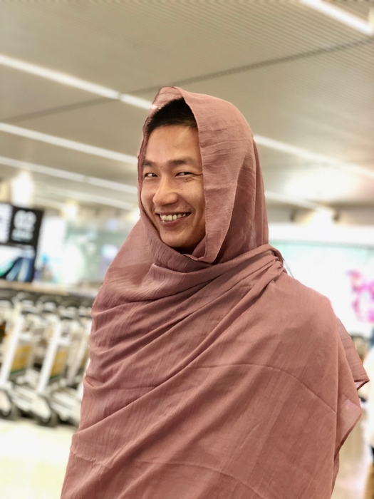 李志(リージー) ツアー中の空港にて