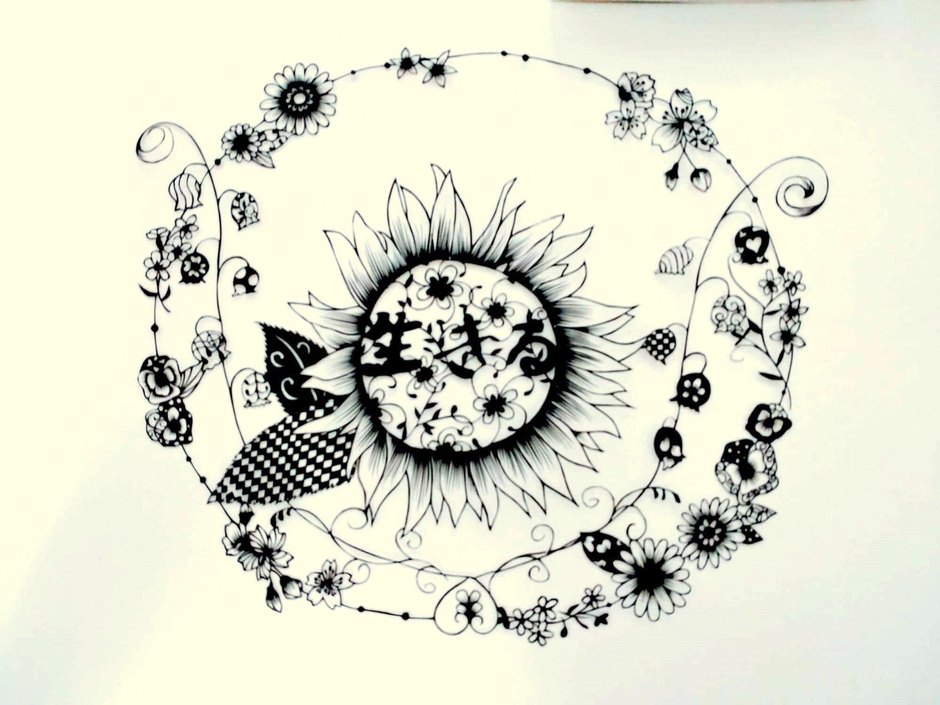 「命のリース」昨年亡くなった従姉妹が闘病中に書いた文字と囲む私たち親族