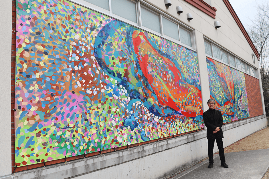 キャンパス・ビジュアル化を象徴するジャンボ壁画が完成