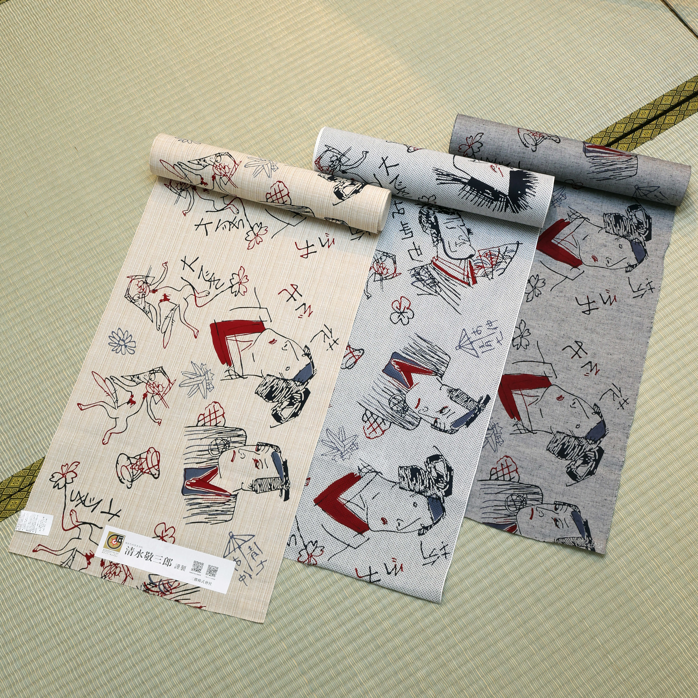 歌川国芳「荷宝蔵壁のむだ書き」素材:綿100%/反物巾:約40cm×長さ:約13m(乱規格)/反物価格:各77,000円(税込)