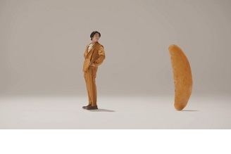 ①賀来さんがくるっと振り返ると 柿の種もくるっと後ろを向く