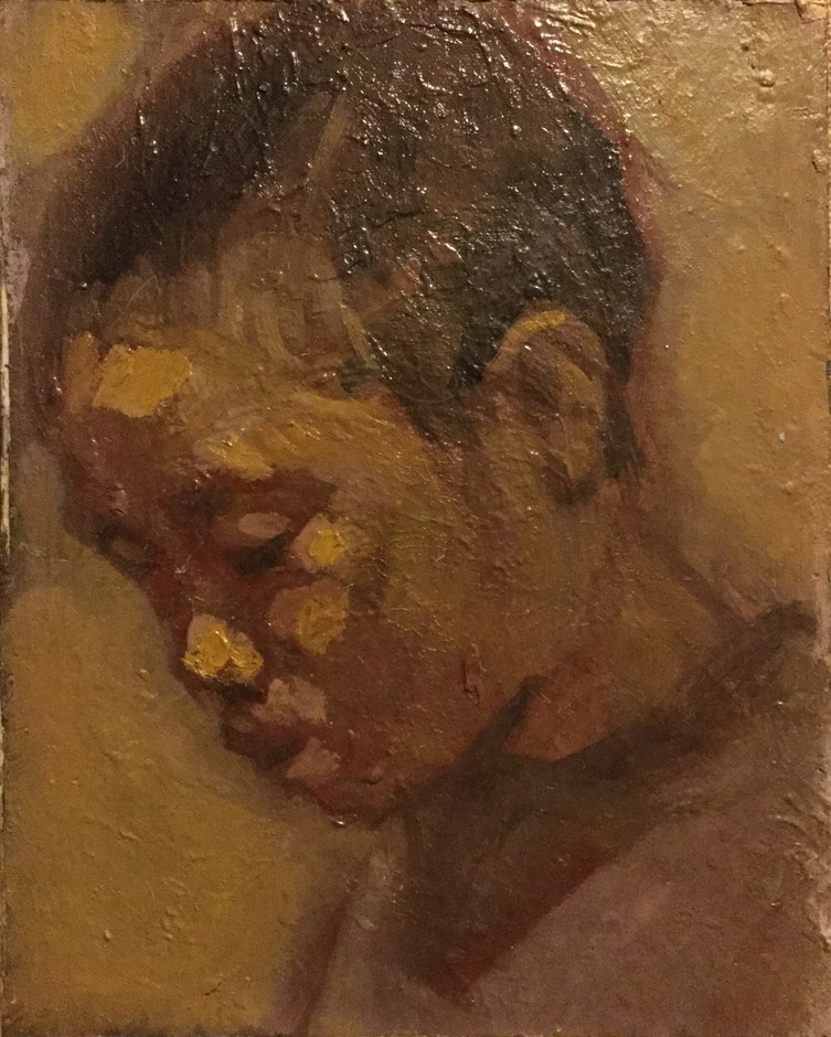 「俯く少年」