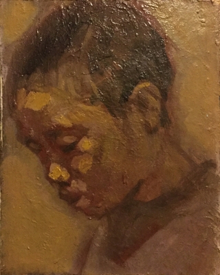 「俯く少年」