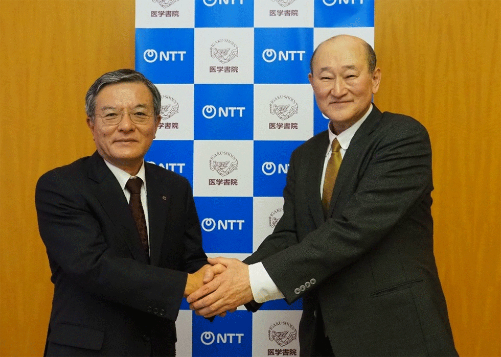 NTT 島田明社長(左)と医学書院 金原俊社長(右)