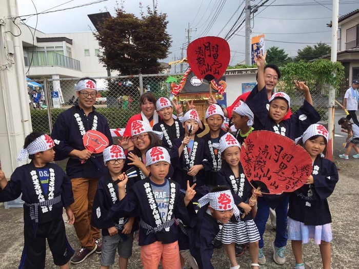 お揃いのハッピを着てそろばんお神輿を担ごう!