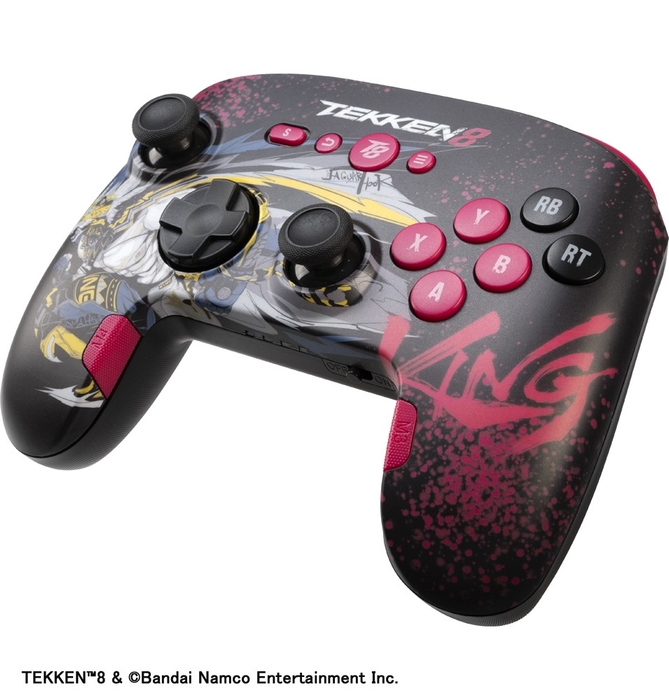 左右のグリップ内側に拡張ボタンを配置